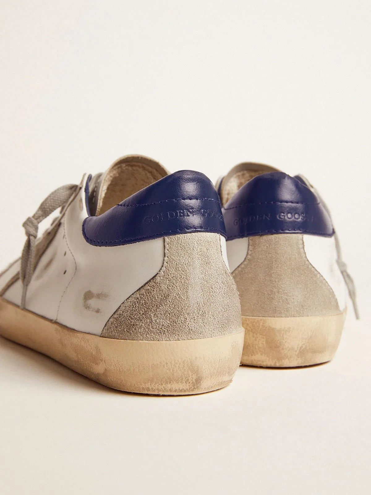 Sneakers with Blue Suede Heel Tab P725549